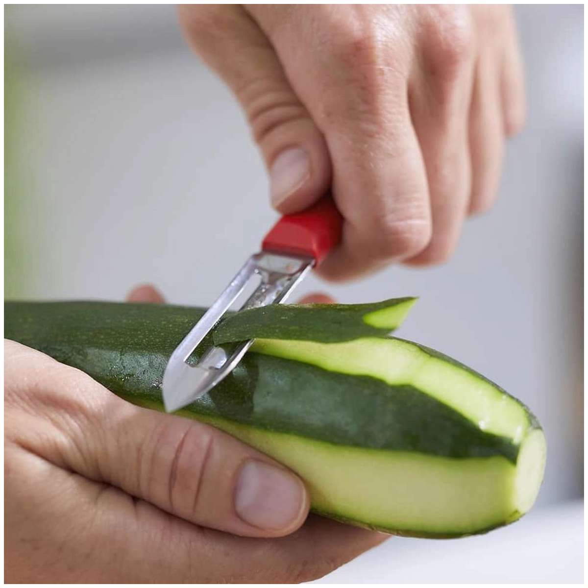 Opinel Stainless Steel Peeler 6 cm with Red Handle No 315 Essentiels+ 002358