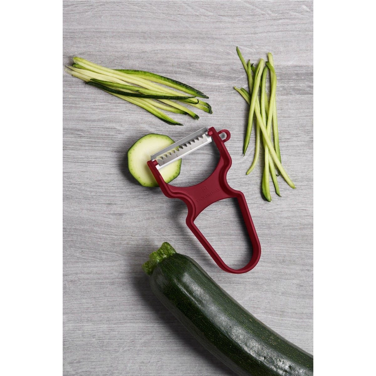 Victorinox Stainless Steel Serrated Peeler Horseshoe With Red Plastic Handle RAPID 6.0933.1